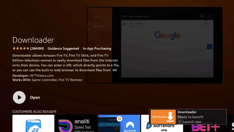 Downloader app page showing Open and a ready-to-launch notification