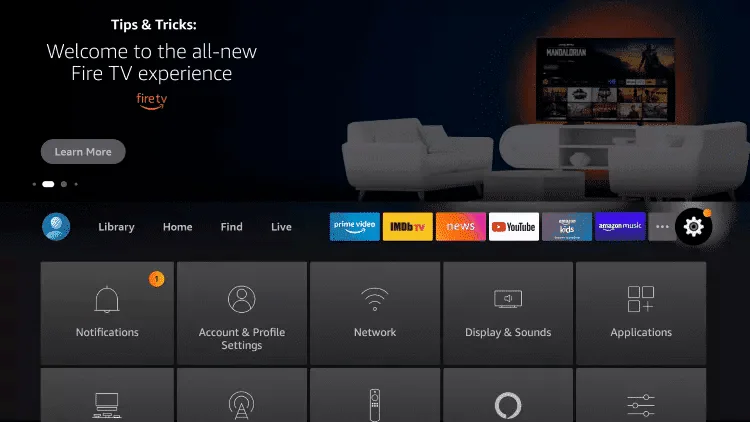 Fire TV home screen with the Settings gear icon selected